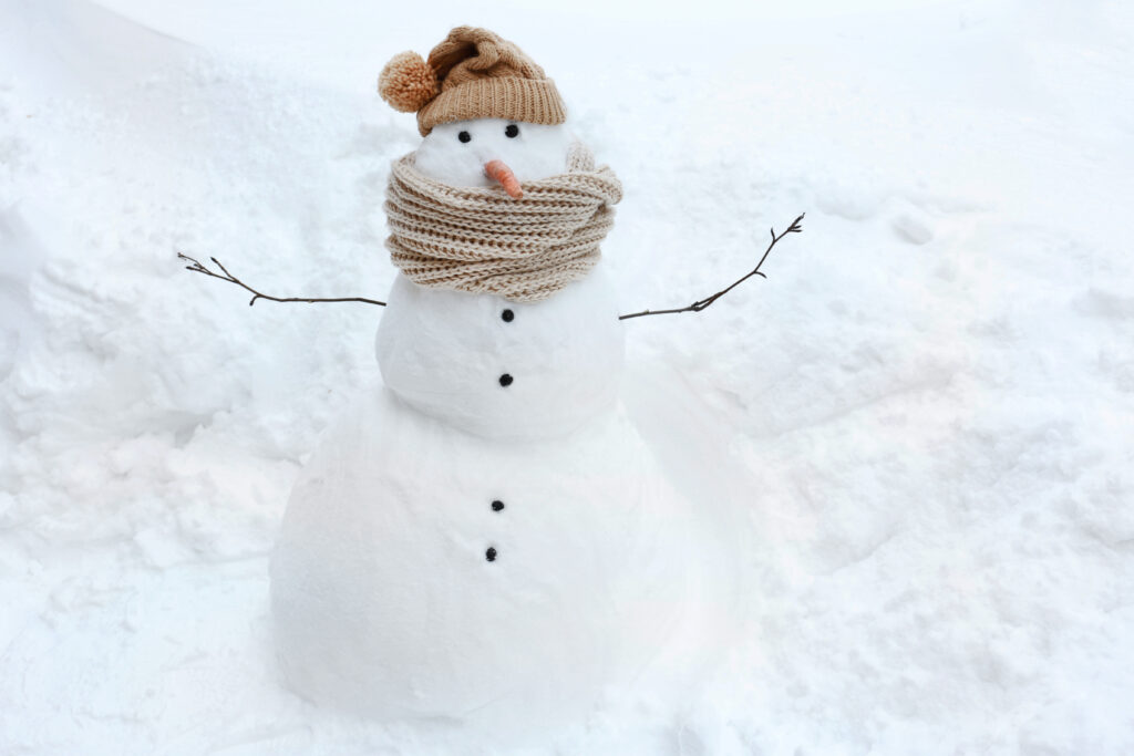 snowman with hat and scarf Holiday Traditions for Baby’s First Year